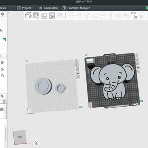 May include: A digital interface for a 3D printer showing a software workspace with a grid layout. On the right, a 3D model of a gray cartoon elephant is displayed. On the left, two circular objects are visible. The top text reads ELEPHANTBASE.