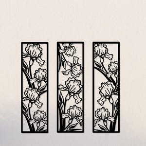 Set of three handmade black metal wall panels featuring elegant floral line art. Shown in modern boho interiors and minimalist kitchens. Perfect for living rooms, bedrooms, or offices. A stylish, nature-inspired wall sculpture that brings balance and sophistication to your home décor.
