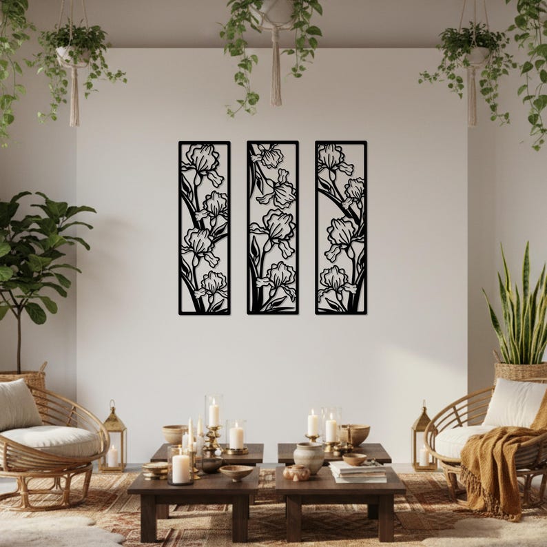 May include: Three black metal wall art panels, each featuring a floral iris design. The panels are rectangular and arranged vertically, creating a cohesive decorative display. The iris flowers are intricately cut out, showcasing the details of the petals and stems.