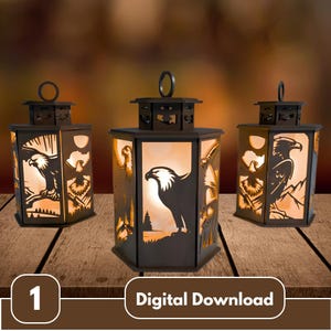 May include: Three dark brown metal lanterns with eagle silhouettes cut into the sides. Each lantern has a handle and a warm, glowing light inside. The text "Digital Download" is at the bottom.