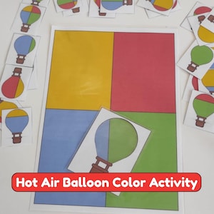 Puede incluir: Un conjunto de actividad de colores de globos aerostáticos que presenta una gran hoja rectangular dividida en cuatro cuadrantes de colores amarillo, rojo, azul y verde. Numerosas tarjetas cuadradas pequeñas que representan varios globos aerostáticos en colores a juego están dispuestas alrededor de la hoja central.