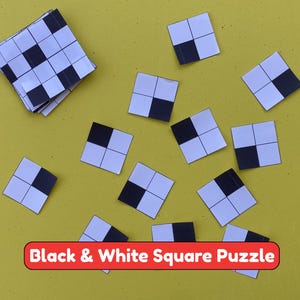 May include: A collection of square puzzle tiles featuring a grid of four smaller squares, with one black square and three white squares arranged in various patterns. A stack of these tiles is visible, and the text Black & White Square Puzzle is present.