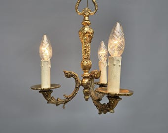 Small French gilded brass triple light chandelier ++