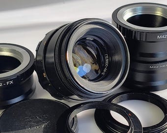 Helios 44-2 f2/58mm The legendary Soviet lens Belomo with an M42 mount, with an adapter of your choice.
