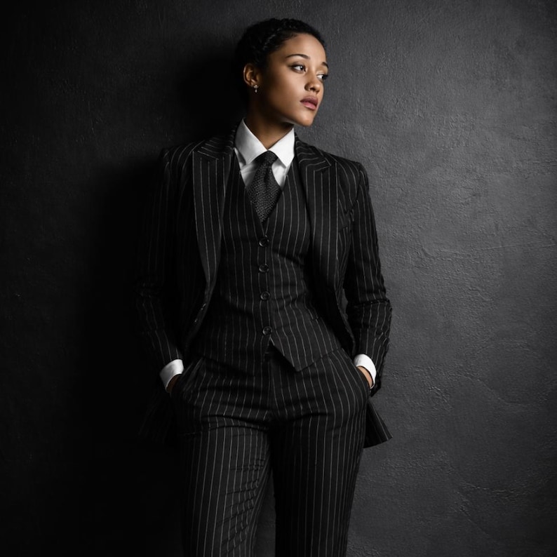 black pinstripe,3 piece women suit,womens tuxedo suit,business suit women,power suit women,formal pantsuit,striped womens suit,tailored blazer set,executive outfit,corporate attire,professional suit,modern womens suit