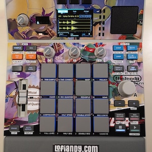 May include: A music production sampler featuring a Teenage Mutant Ninja Turtles graphic skin, a central digital display, sixteen grey square pads, three control knobs, a fader, and various function buttons. The device includes a Nintendo logo and lofiandy.com branding.