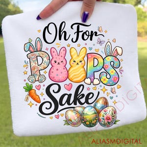 May include: White Easter-themed towel with the phrase "Oh For Peeps Sake" in black script. The word "Peeps" is designed with bunny ears and colorful patterns. Decorated with hearts, butterflies, and Easter eggs.