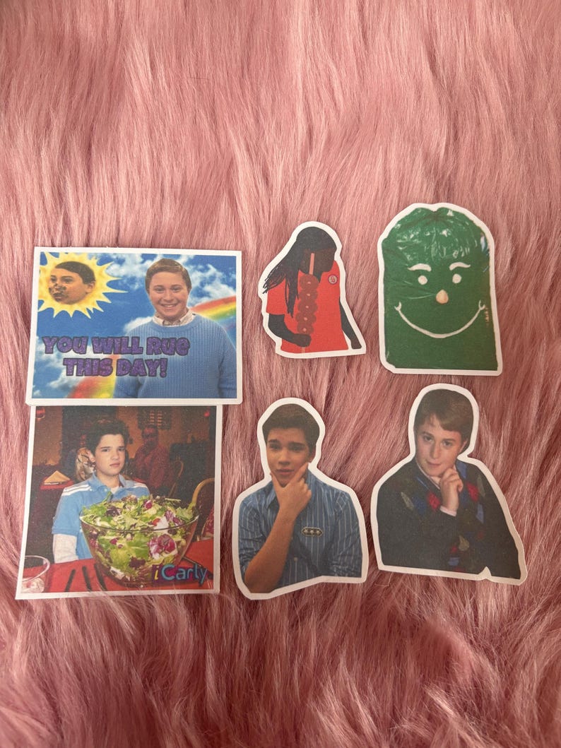 May include: A collection of six stickers featuring characters and scenes from the television show iCarly. The stickers include a rectangular print with the text YOU WILL RUE THIS DAY, a green character, and various portraits of individuals.