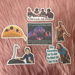 May include: A collection of die-cut stickers featuring images and text. The stickers include quotes like "Is that a sock...full of butter?" and "When Temperatures Get Too High The Elderly Will Start To Die." Other stickers feature cartoon images.