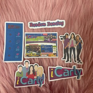 May include: A collection of six iCarly themed stickers featuring the show logo, a website interface, the cast members, and the text Random Dancing. The stickers are rectangular and die-cut with colorful graphics and blue, red, and yellow branding.