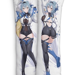May include: Two white body pillows featuring a detailed anime-style illustration of a character with light blue hair, wearing a black and white outfit with blue accents. The character is lying down on the pillows.