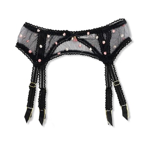 Pastel dot embroidered black French lace suspender belt for wear with traditional stockings. Strappy comfortable elastic in trellis picot style with gold hardware and black satin garter covers, finished with a rainbow tassel in sweet lingerie style.