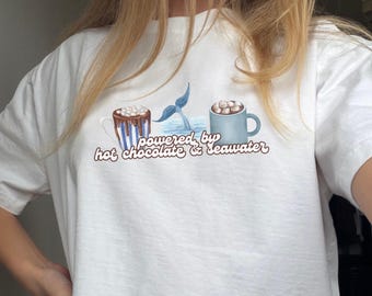 Powered By Hot Chocolate and Seawater, Hot Cocoa Lover, Cozy Christmas Tee, Whale Tail Graphic, Ocean Shirt Gift
