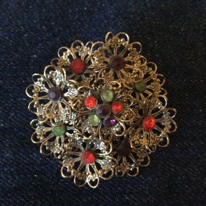 Floral Design Goldtone Brooch With Multi Color Stones
