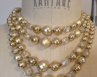 Four Strand Bead Necklace  Round Gold And Opalescent  Faceted Clear Beads Adjustable Length