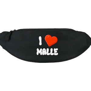 May include: Black fanny pack with the text "I ❤️ MALLE" in white and a red heart graphic. The fanny pack has a zipper closure and a curved shape.