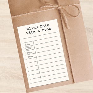 May include: A parcel wrapped in brown paper, tied with twine, and a label that says "Blind Date With A Book." The label has sections for genre, Goodreads rating, pages, and clues.