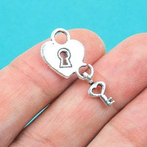 6 Antiqued Silver Tone Metal Moveable LOCK and KEY HEART Charm Pendants .  chs0004