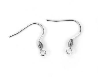 May include: Two silver-colored earring hooks, displayed against a white background. Each hook features a curved wire design with a coiled spring detail and a small loop at the bottom, perfect for jewelry making.