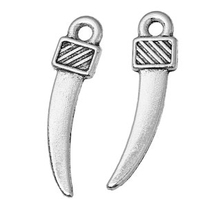 May include: Two silver-colored metal charms shaped like curved fangs. Each charm has a rectangular top with diagonal lines and a loop for attaching to jewelry. The charms are set against a white background.