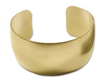 May include: A wide, gold-colored cuff bracelet. The bracelet has a smooth, polished surface and a curved design. The open cuff style allows for easy wear. The bracelet is a simple, yet elegant accessory.