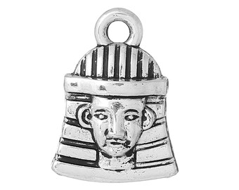 May include: A silver-colored charm featuring the stylized face of an Egyptian pharaoh. The charm has a loop at the top for attaching to a necklace or bracelet. The pharaoh's face is detailed with facial features and a striped headdress.