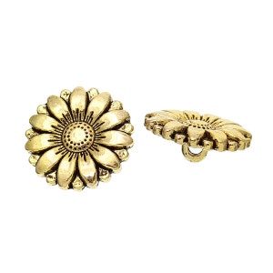 May include: Two antique gold-colored metal buttons in the shape of a daisy flower. One button is viewed from the front, and the other is viewed from the side, showing the loop on the back. The buttons have detailed petal and center designs.
