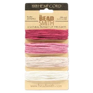 May include: A card of The Bead Smith hemp cord in shades of pink and white. The card reads "100% Hemp Cord" and "A Natural Product of the Earth." Each color is 4.9 yards (30 ft) long.