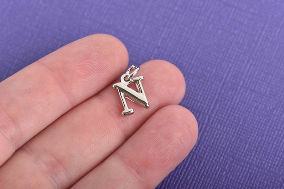 Greek Alphabet Letter Lambda Charm Sterling Silver - Made in the USA Greek Alphabet Letter Lambda Charm Sterling Silver - Made in the USA