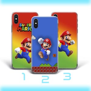 May include: Three phone cases featuring the Super Mario character. The cases have a red, yellow, and green gradient background. The Super Mario logo is on one case. The other cases feature Mario in action poses.