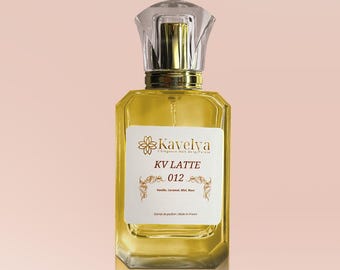 May include: A rectangular glass perfume bottle filled with a golden liquid, featuring a clear faceted cap and a gold collar. The white label displays the text Kavelya, KV LATTE, 012, and lists ingredients including Vanille, Caramel, Miel, Musc.