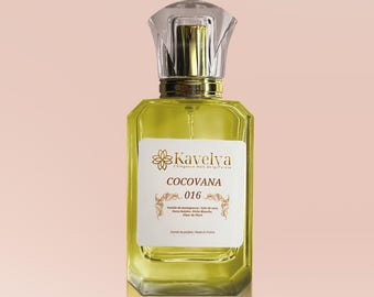 May include: A rectangular glass perfume bottle filled with yellow liquid, featuring a gold collar and a clear faceted cap. The white label displays the text Kavelya, COCOVANA, 016, and lists ingredients including vanilla, coconut, and floral notes.