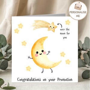 May include: A square greeting card featuring a yellow crescent moon character with a smiling face, surrounded by yellow stars and a shooting star. The text reads "over the moon for you" and "Congratulations on your Promotion" in black font.
