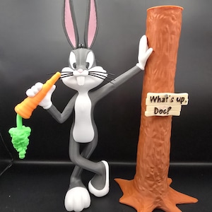 Bugs figurine leaning against Tree-3D Printed Figure – Cartoon Inspired Desk Decor – Cartoon Rabbit Collectible –Display Piece