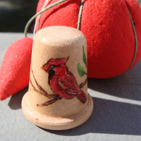 wood thimble with woodburned cardinal design