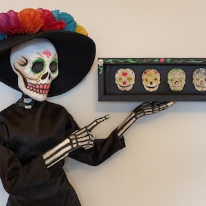 Painted to the Bone: A Floral Shrine of Sugar Skulls- Day of the Dead Ceramic Wall Art
