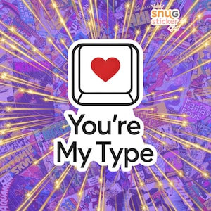 May include: A sticker with a keyboard key design featuring a red heart, with the text "You're My Type". The background is a collage of comic book covers with a purple and yellow colour scheme.