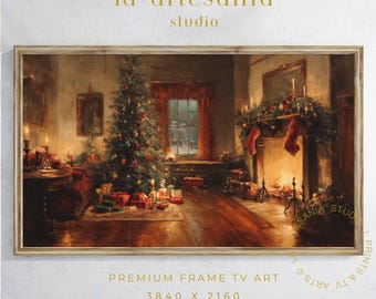 May include: A framed print depicting a festive Christmas interior. A decorated tree, fireplace with stockings, and presents are visible. The text "la artesanía studio" is at the top, and "PREMIUM FRAME TV ART" is at the bottom.