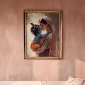 a framed painting of a woman embracing a child, with the woman appearing to be a mother and the child being Krishna, a Hindu deity.