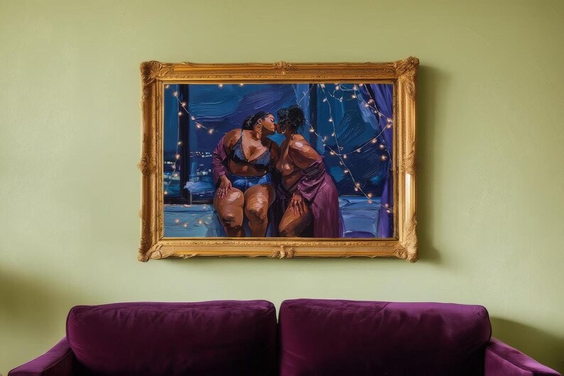 a painting of two women in a romantic embrace, hanging on a green wall above a purple couch.