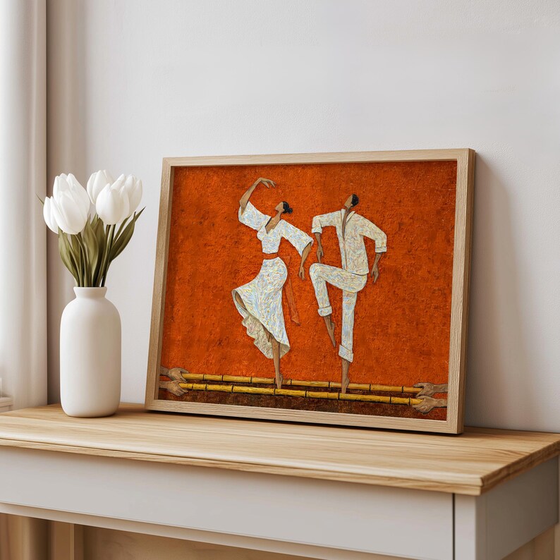 Styled shelf display with terracotta Filipino Tinikling Art Print, framed on console next to white vase with tulips