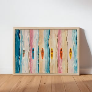 May include: A framed rectangular art print featuring six vertical panels of textured paint in shades of blue, pink, and beige. Each panel contains a small, centered figure standing on a surfboard in colors of white, blue, orange, yellow, and red.