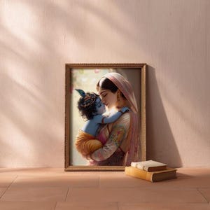 A framed painting of a woman embracing a child is displayed on a wall, with a stack of books and a doorway visible in the background.