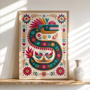May include: A rectangular wall art print featuring a stylised teal serpent shaped like the letter S, decorated with vibrant floral patterns in pink, yellow, and light blue. Two small birds face each other at the base, surrounded by symmetrical botanical motifs.
