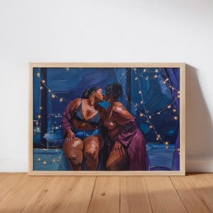The image is a framed painting depicting two women in intimate conversation, with a string of lights in the background.