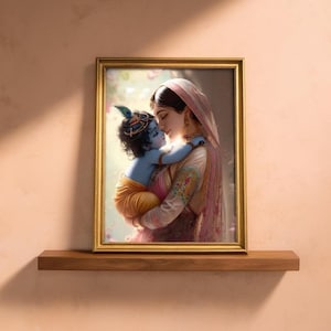 A framed image of a woman embracing a child, likely a depiction of the Hindu deity Radha, is displayed on a wooden shelf against a peach-colored wall.