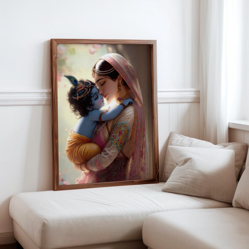 a framed painting of a woman holding a child, with the child appearing to be a baby. The painting is displayed on a wall in a room with a white couch and a window.