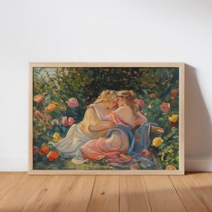 May include: A framed artwork showing two figures in a garden. They are draped in flowing cream, pink, and blue garments. The background features lush greenery and colourful roses. The frame is made of wood.