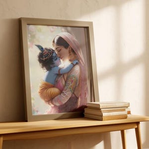 a framed painting of a woman embracing a child, with the child wearing a crown. The painting is displayed on a wooden table, and there are some books stacked nearby.