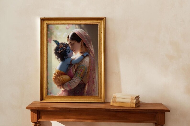 a framed painting of a woman embracing a child, likely a depiction of the Hindu deity Radha and her son, Krishna. The painting is displayed on a wooden shelf, and there are some books placed next to it.